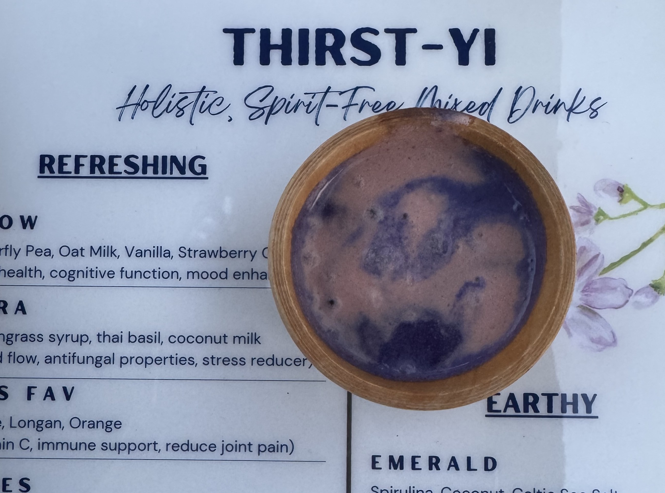 Zoomed Thirst-Yi menu with yin-yang purple pink beverage